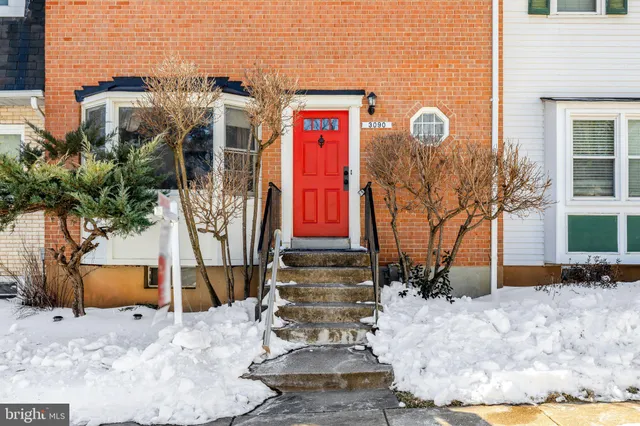 a view of a building with a yard