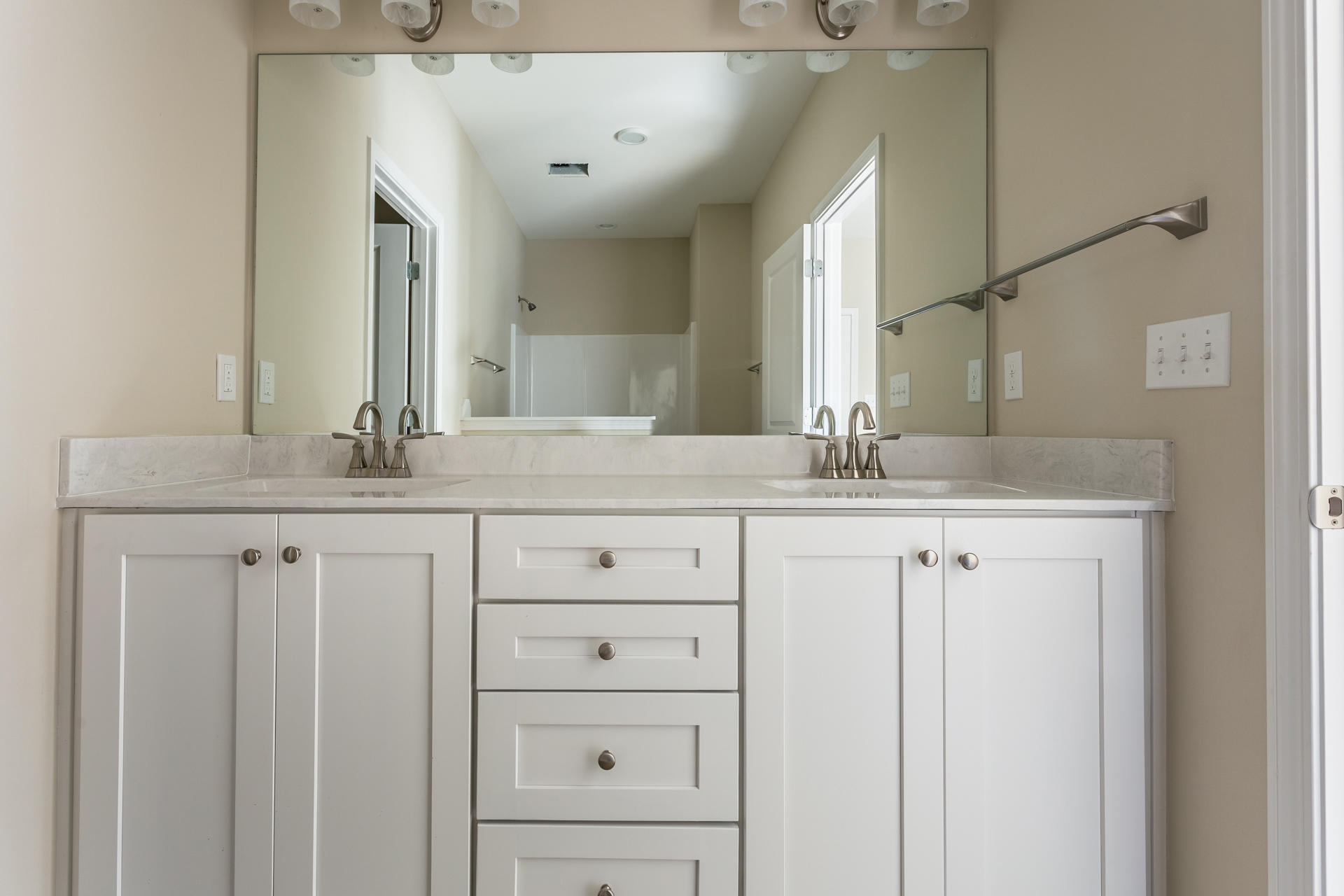 343 Indian Woman Road Santa Rosa Beach, FL 32459 - Photo 15 of 21 a bathroom with a double vanity sink and a mirror