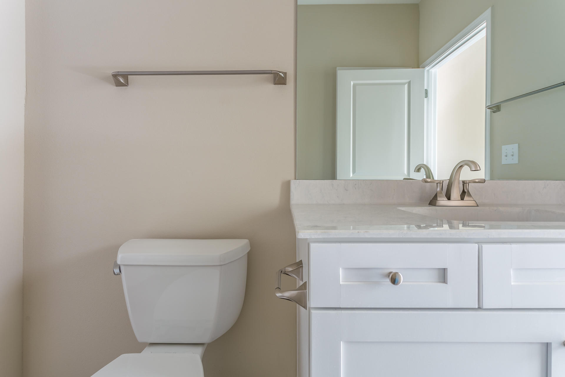 343 Indian Woman Road Santa Rosa Beach, FL 32459 - Photo 10 of 21 a bathroom with a toilet sink and mirror