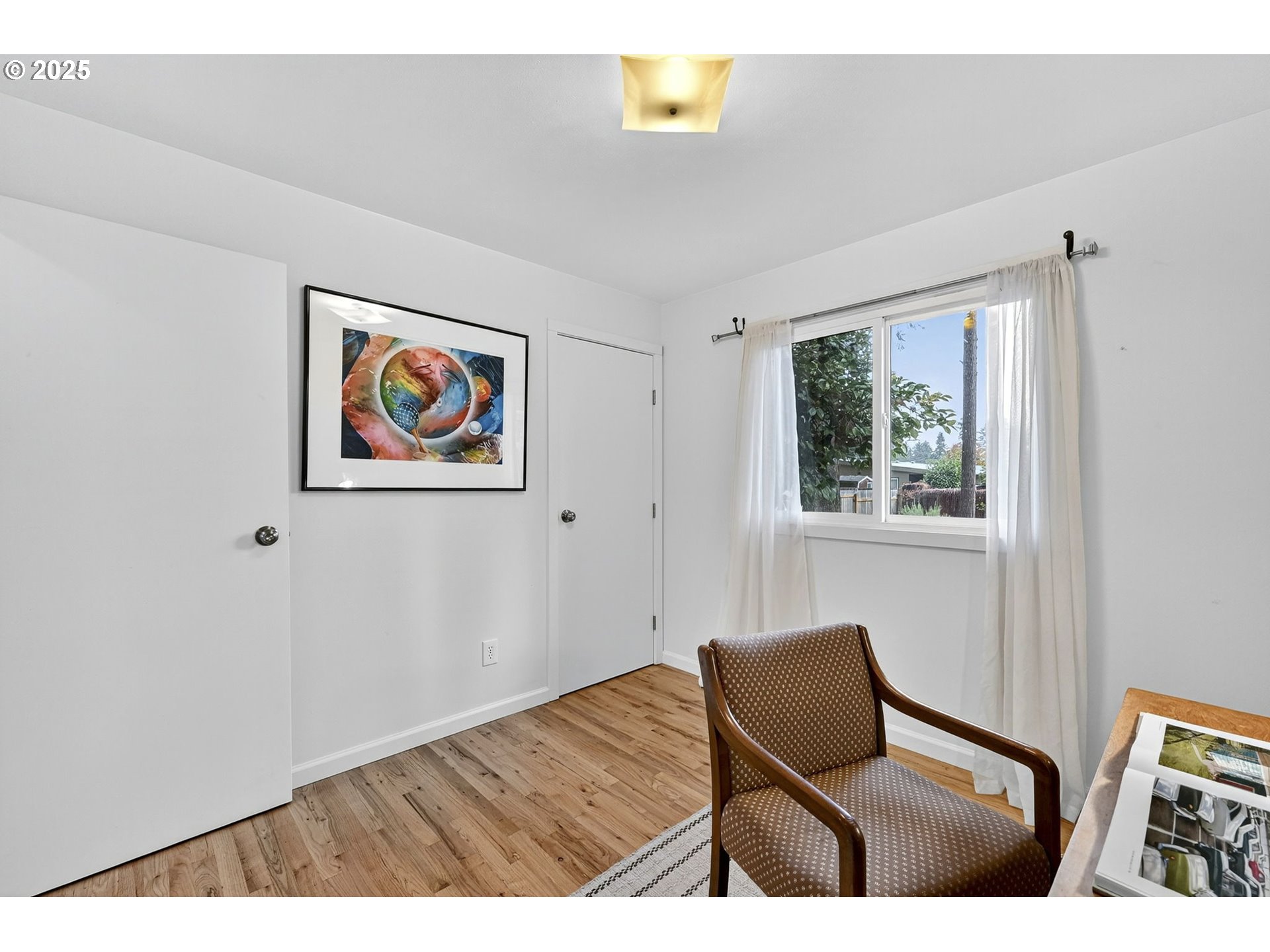 830 Northeast 172nd Avenue Portland, OR 97230 - Photo 18 of 31 a view of room with window and lounge chair