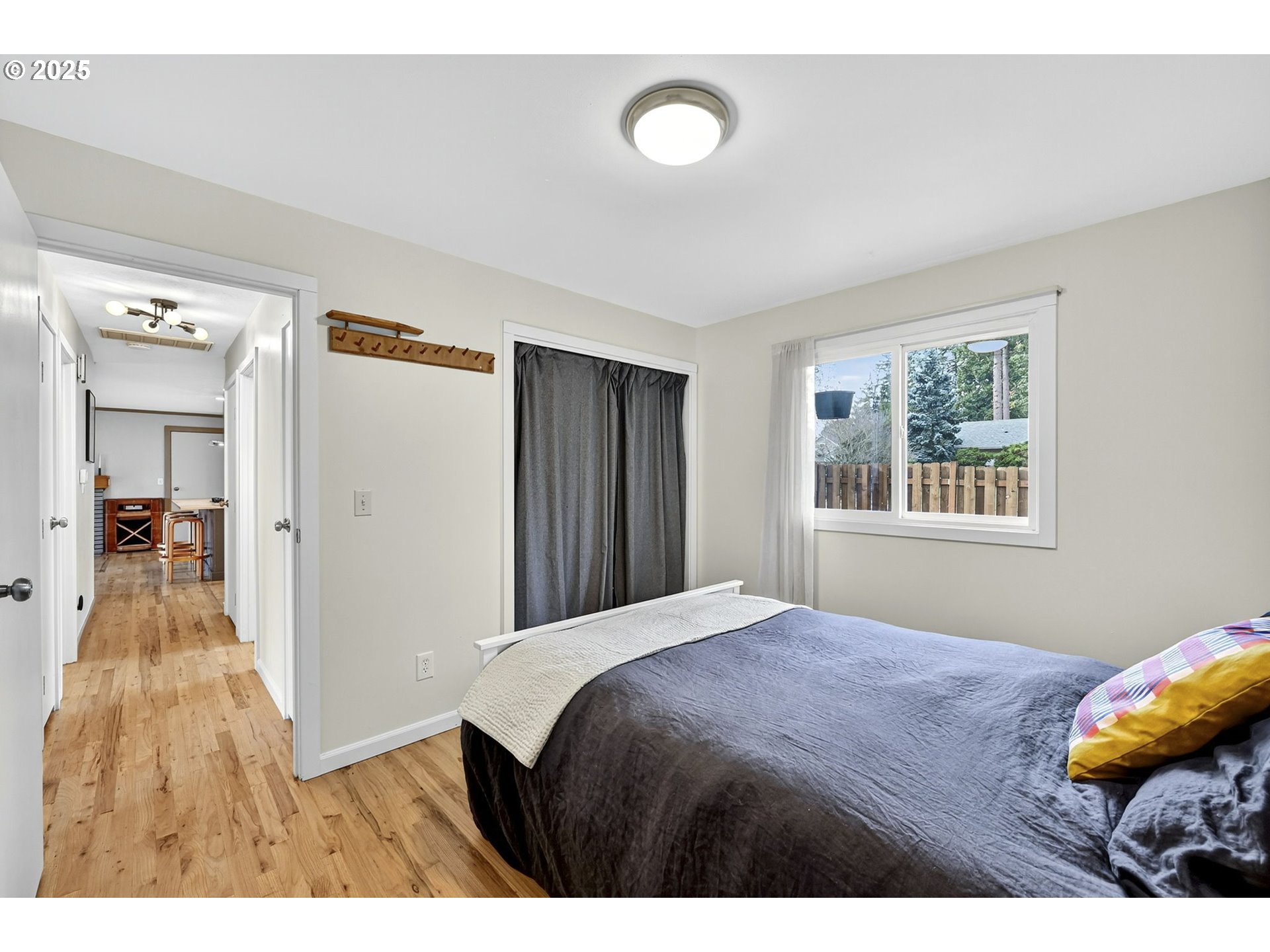 830 Northeast 172nd Avenue Portland, OR 97230 - Photo 20 of 31 a bedroom with a bed and a window