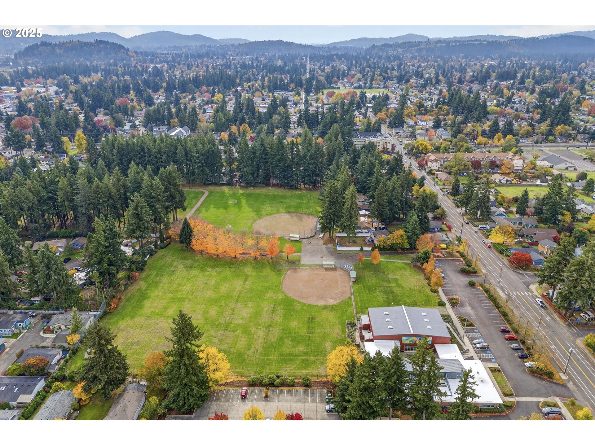 830 Northeast 172nd Avenue Portland, OR 97230 - Photo 29 of 31 a view of a city with mountains in the background