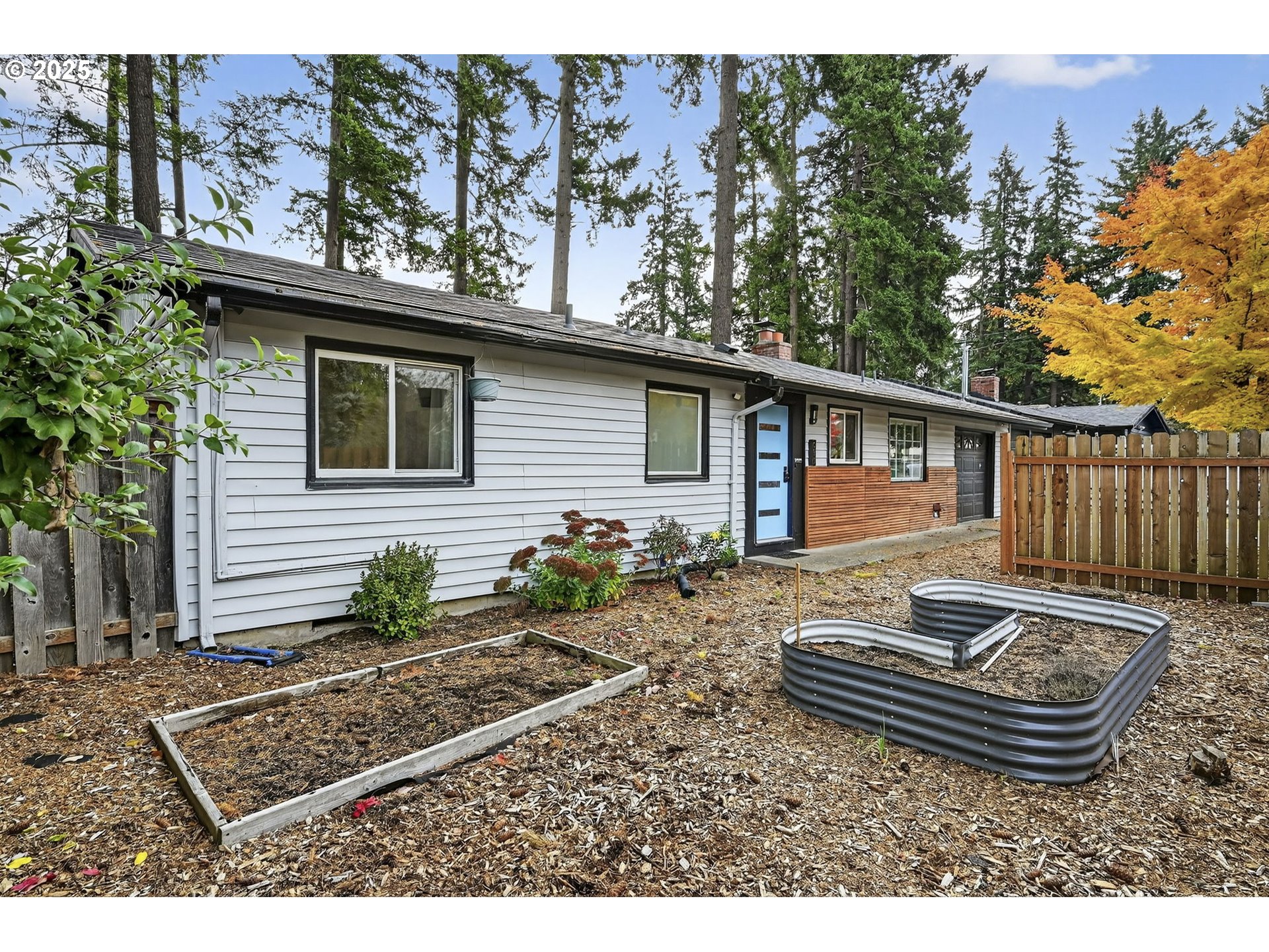 830 Northeast 172nd Avenue Portland, OR 97230 - Photo 4 of 31 a view of house with backyard and sitting area