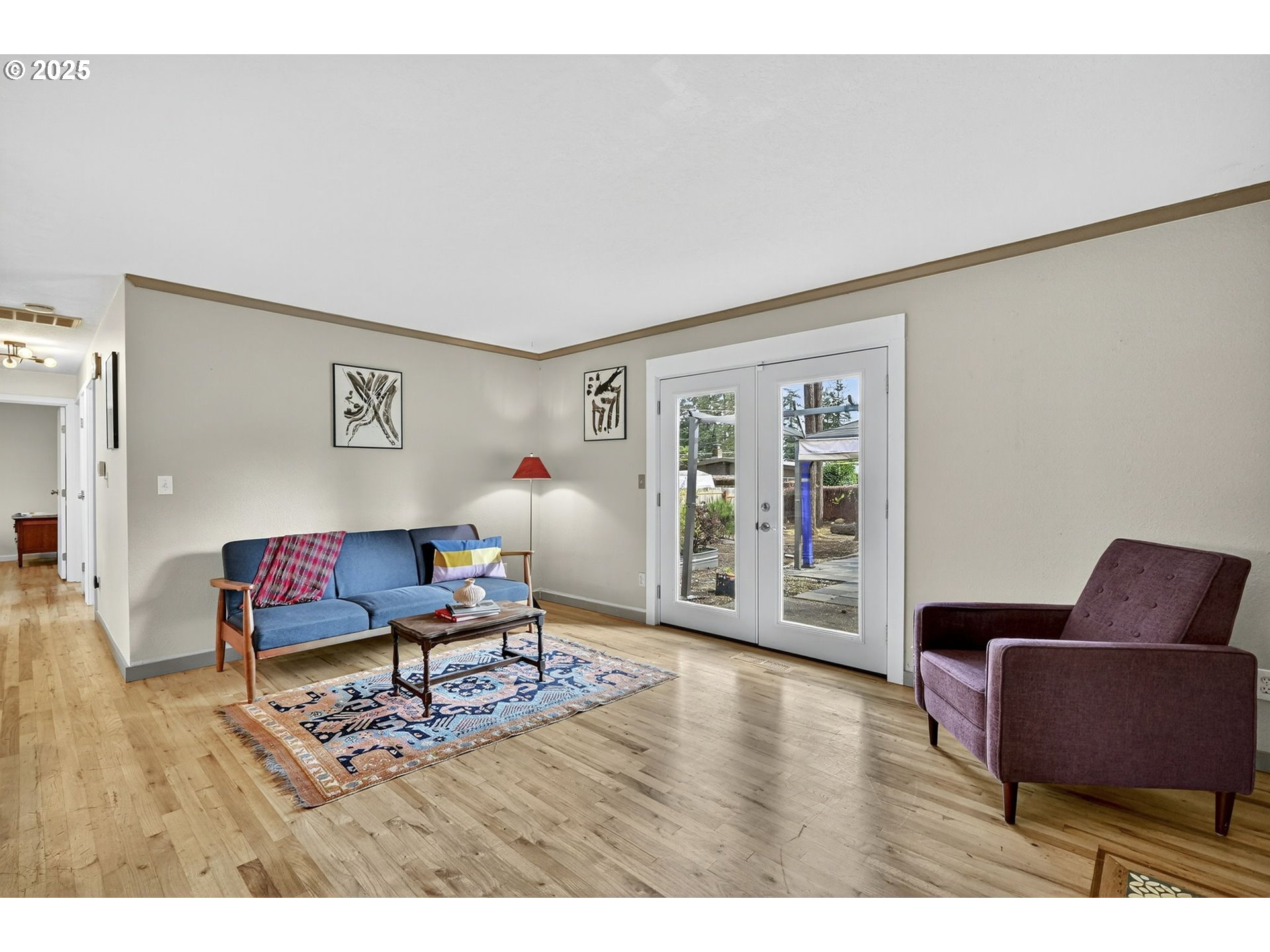 830 Northeast 172nd Avenue Portland, OR 97230 - Photo 8 of 31 a living room with furniture and a wooden floor