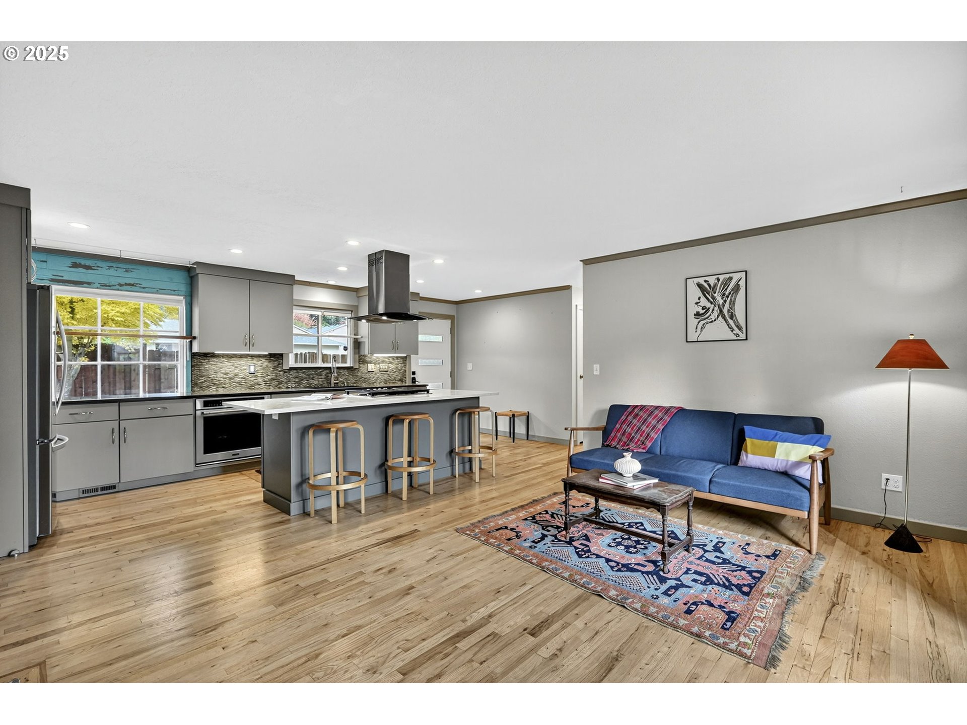 830 Northeast 172nd Avenue Portland, OR 97230 - Photo 10 of 31 a living room with furniture and a wooden floor
