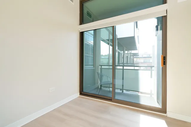 a view of balcony with furniture