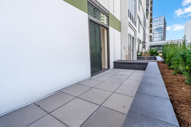 a living room with lots of furniture and a clock