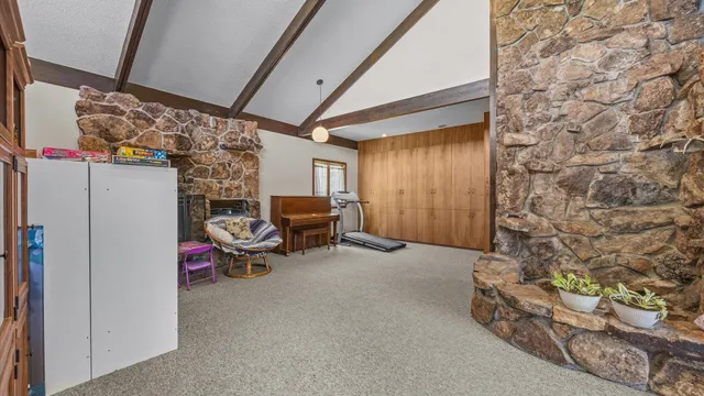 a view of staircase with wooden floor and a potted plant