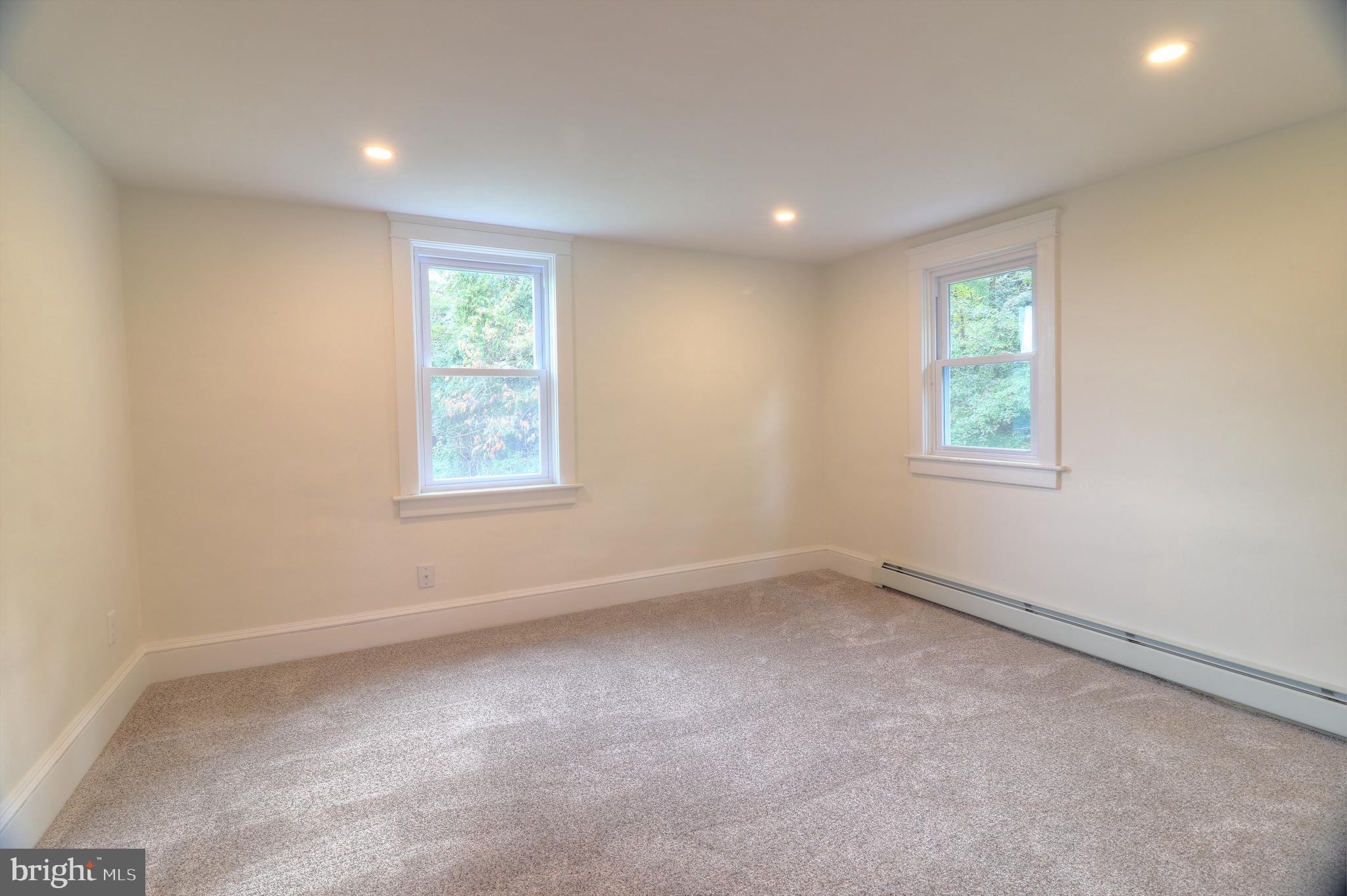 678 Rockville Road Spring Grove, PA 17362 - Photo 17 of 32 an empty room with windows