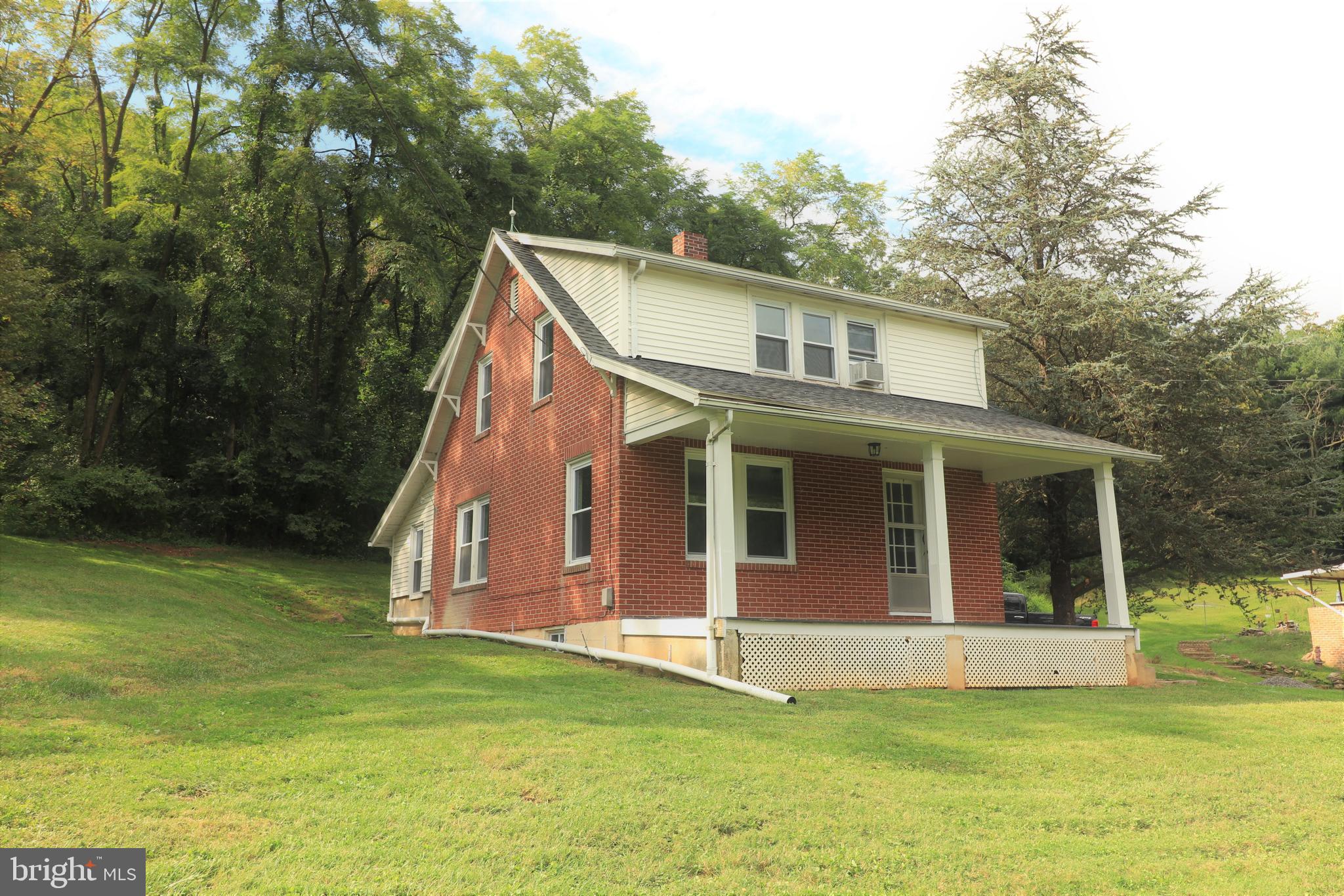 678 Rockville Road Spring Grove, PA 17362 - Photo 22 of 32 a view of a house with backyard
