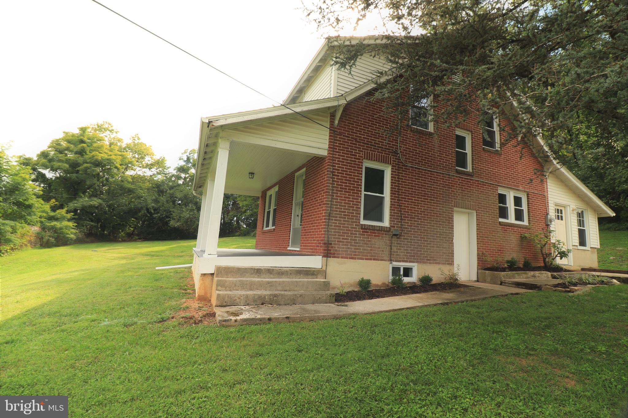 678 Rockville Road Spring Grove, PA 17362 - Photo 25 of 32 a front view of house with yard