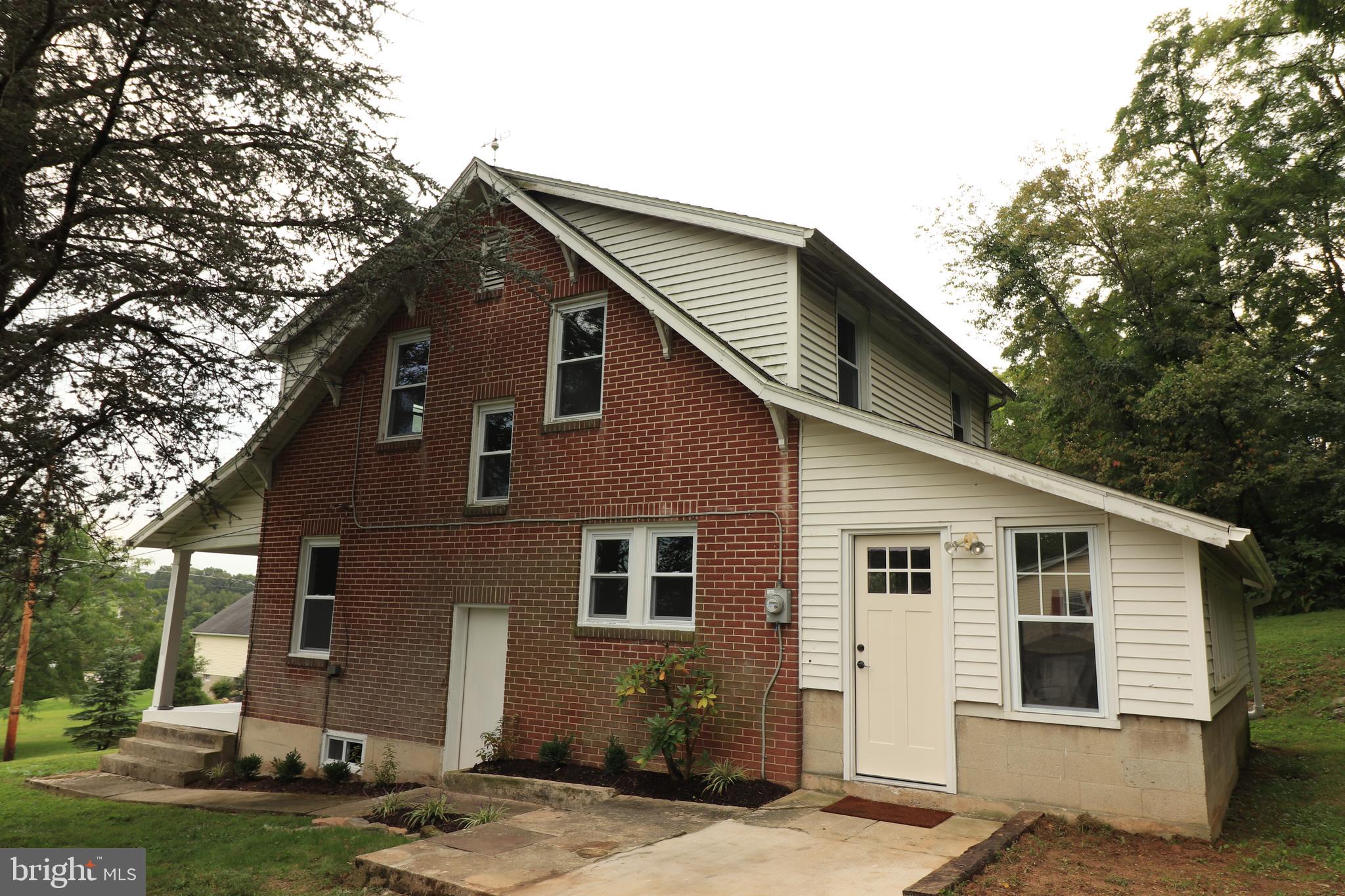678 Rockville Road Spring Grove, PA 17362 - Photo 28 of 32 a front view of a house with a yard