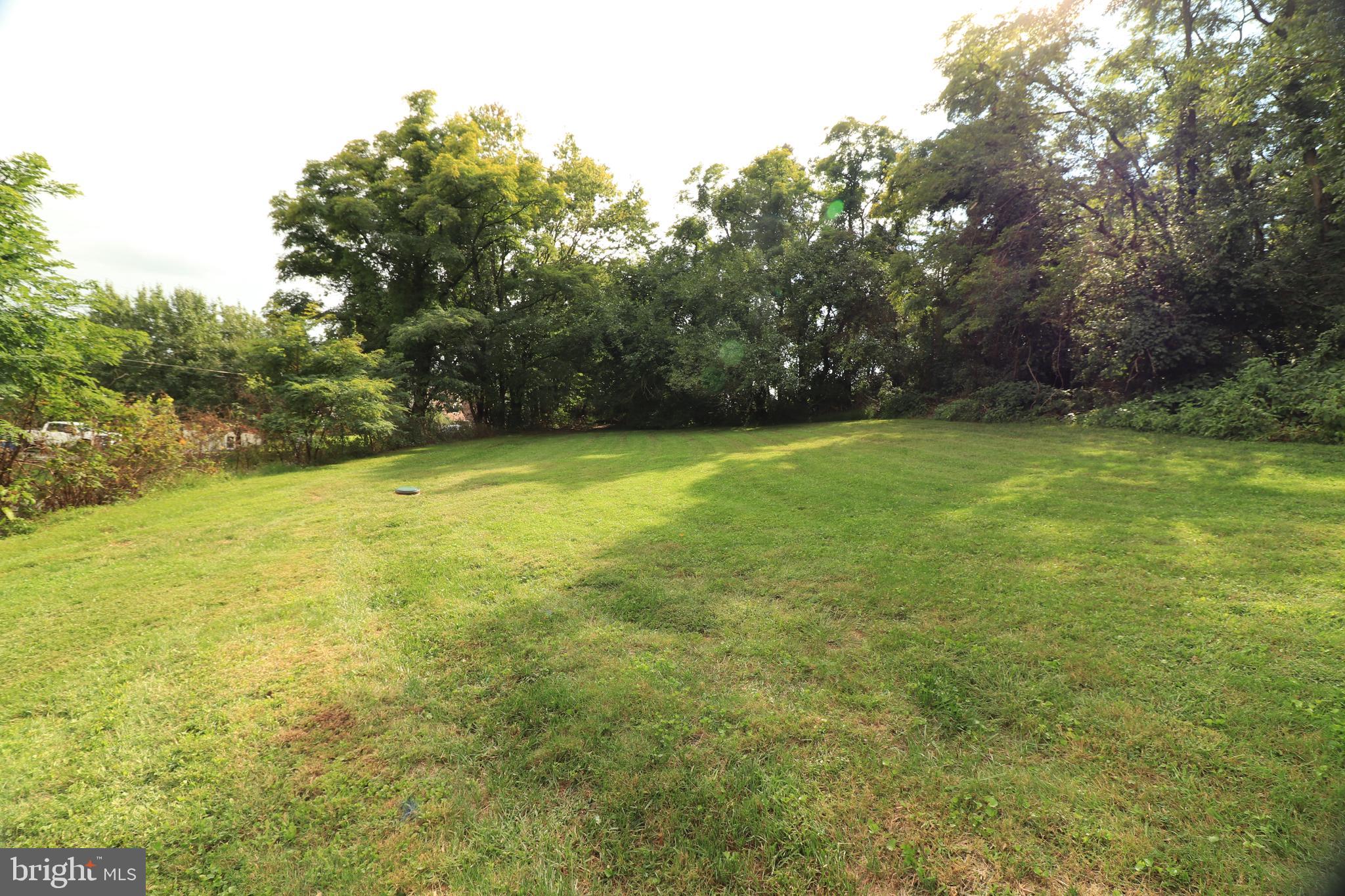678 Rockville Road Spring Grove, PA 17362 - Photo 29 of 32 a view of a field with trees in the background