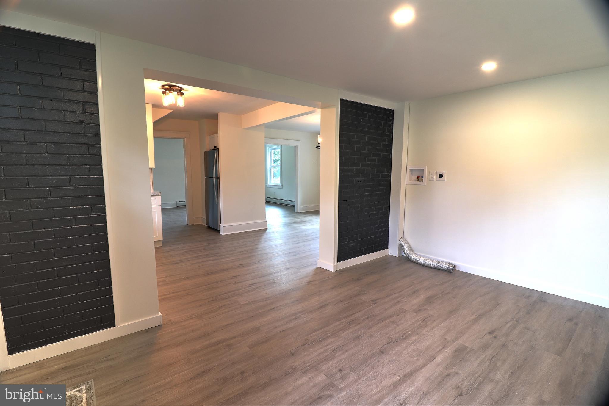 678 Rockville Road Spring Grove, PA 17362 - Photo 10 of 32 a view of a hallway with wooden floor