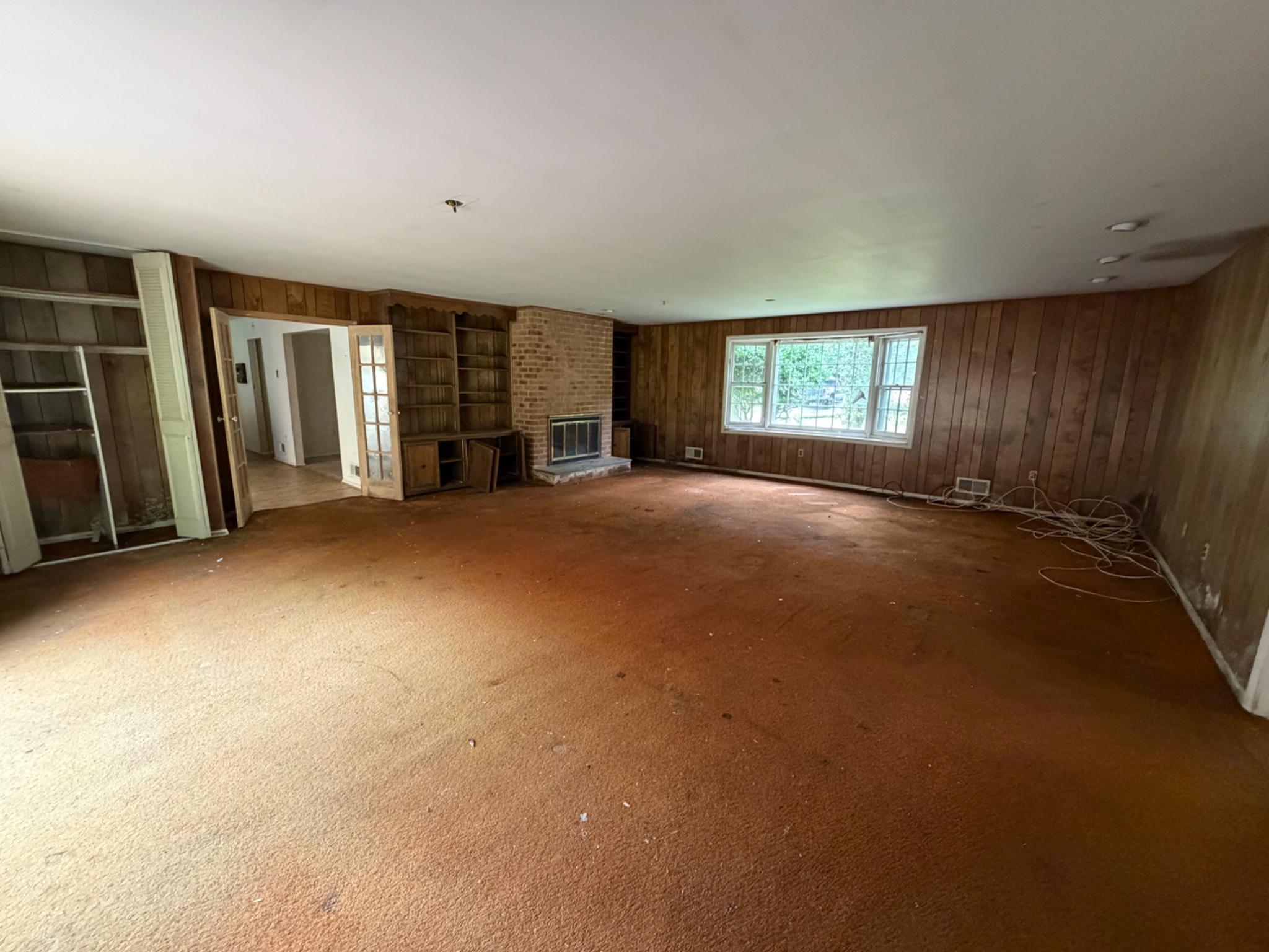 913 Windmill Lane Silver Spring, MD 20905 - Photo 14 of 19 Spacious room with rustic charm.
