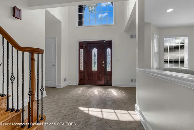 a view of an entryway with a fireplace