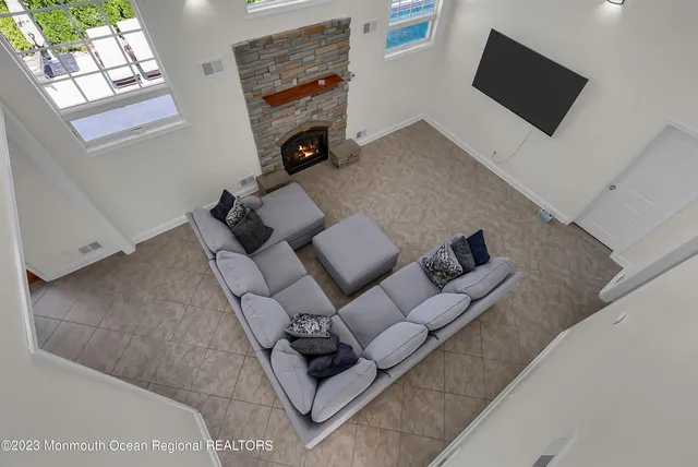 a view of staircase with black white walls