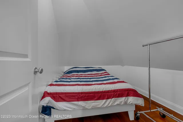 a bathroom with a sink a mirror and a shower
