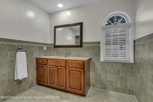a bathroom with a shower and toilet