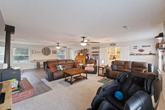 an aerial view of residential houses with outdoor space