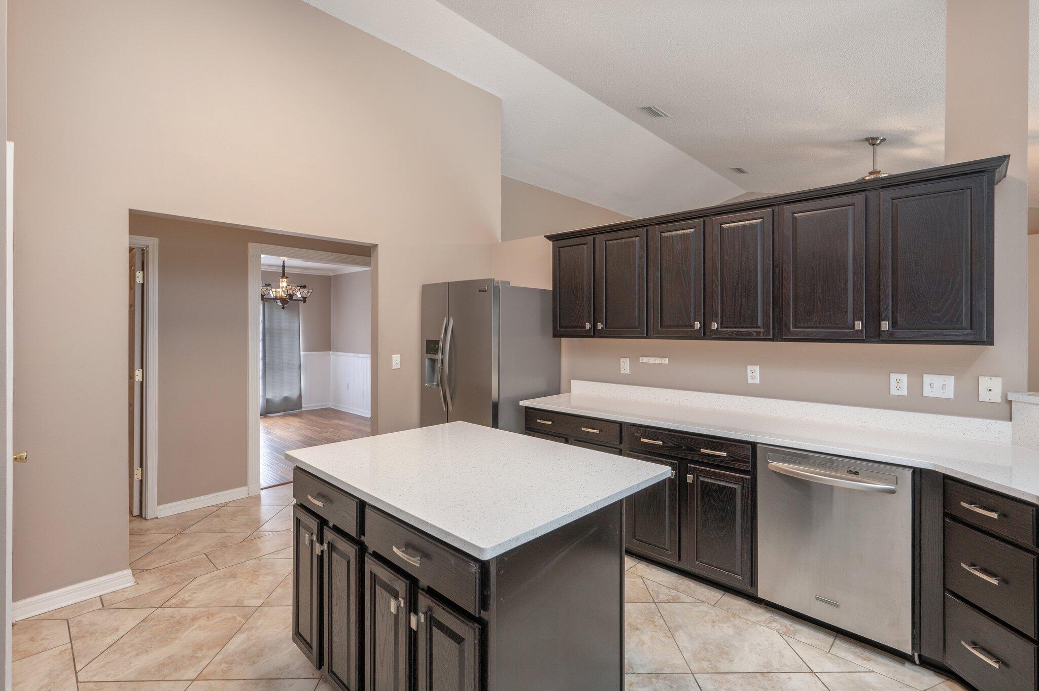 4752 Balboa Road Crestview, FL 32539 - Photo 11 of 46 a kitchen with a sink and cabinets
