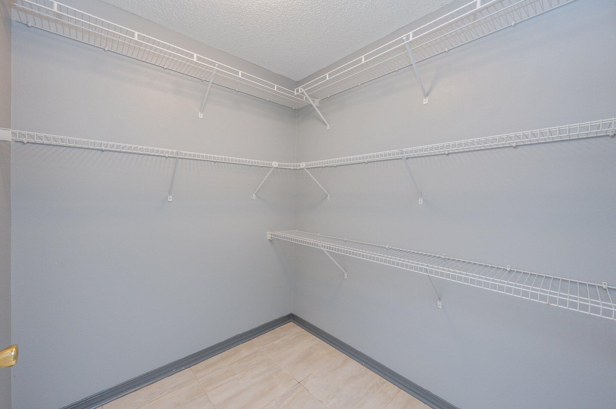 4752 Balboa Road Crestview, FL 32539 - Photo 28 of 46 a view of a room with racks on the wall