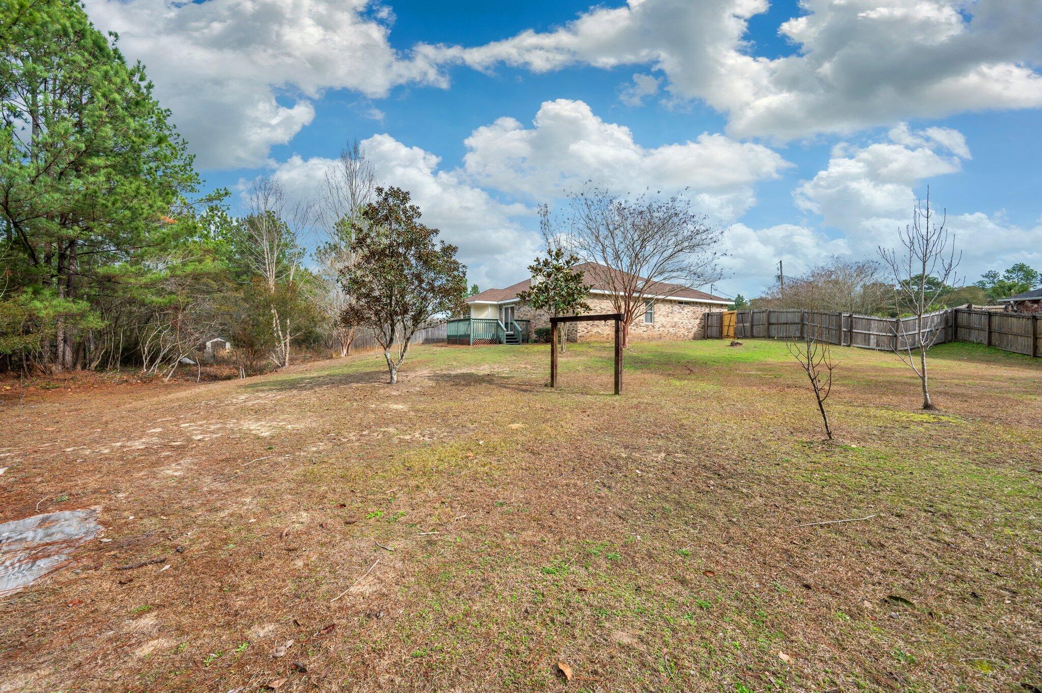 4752 Balboa Road Crestview, FL 32539 - Photo 43 of 46 a view of yard with tree