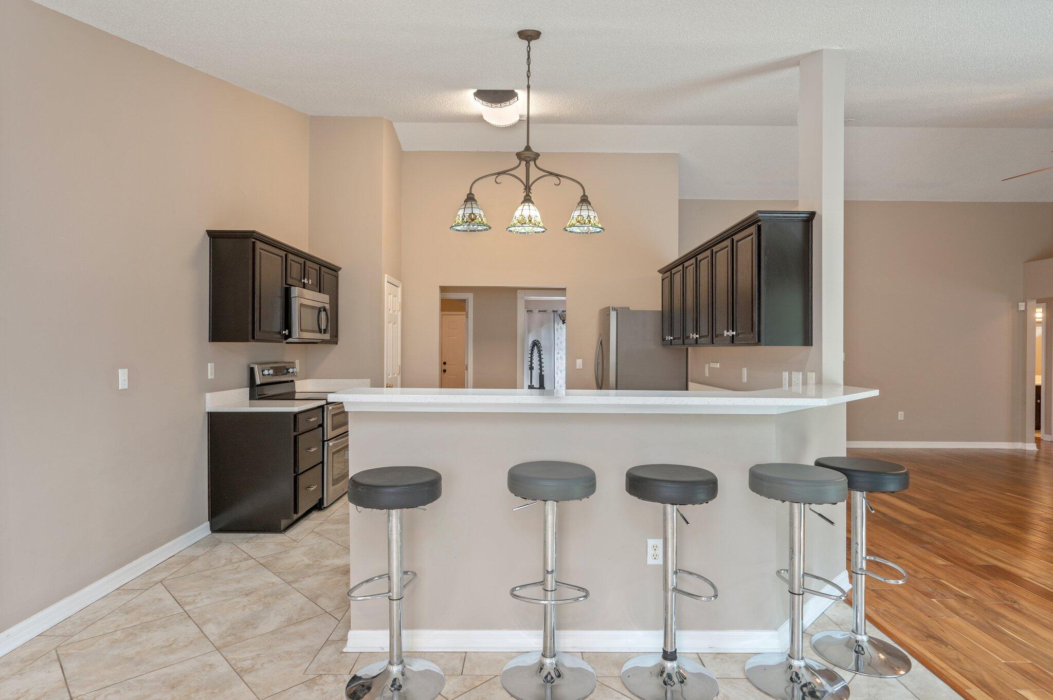 4752 Balboa Road Crestview, FL 32539 - Photo 10 of 46 a dining room with furniture and window