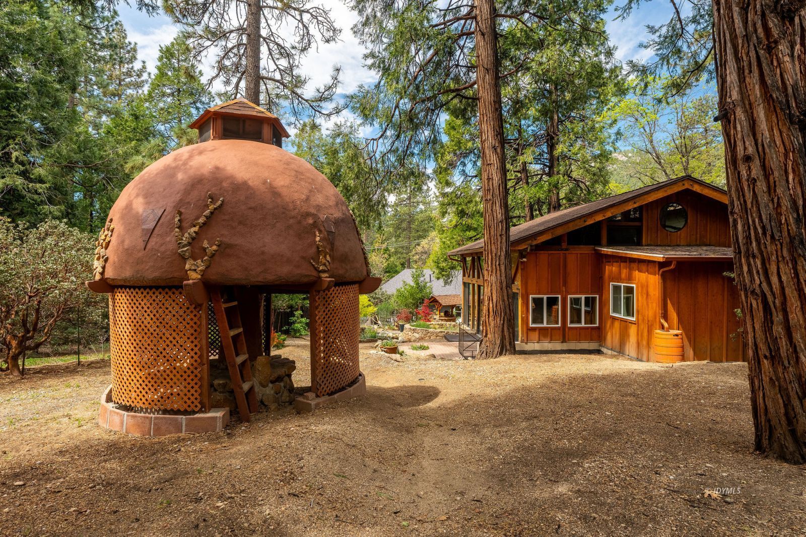 25106 Rim Rock Road Idyllwild, CA 92549 - Photo 63 of 71 a view of a car park in front of house