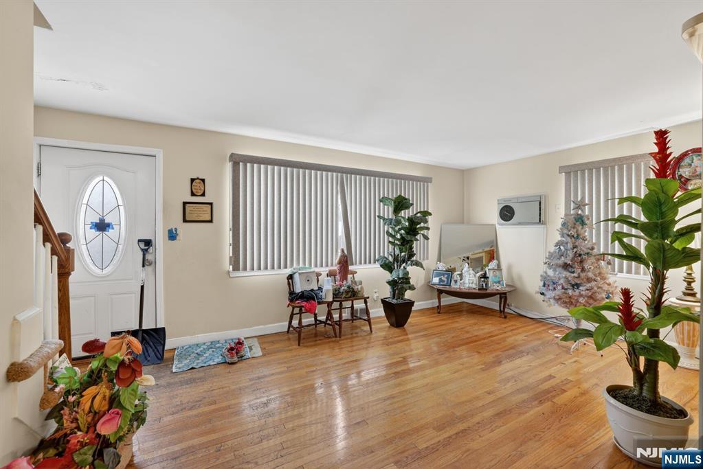 736 Vivian Terrace Union, NJ 07083 - Photo 2 of 16 a living room with furniture and a potted plant