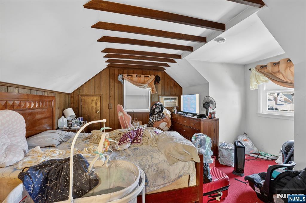 736 Vivian Terrace Union, NJ 07083 - Photo 7 of 16 a bed room with a bed and a chair