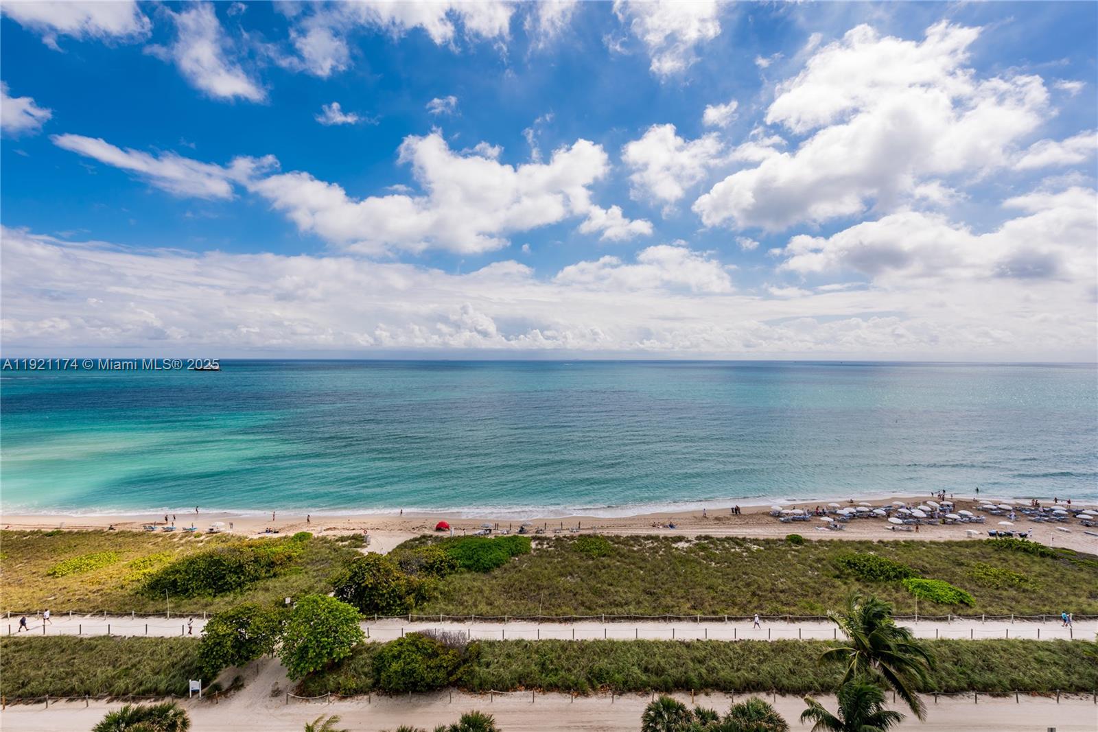 9499 Collins Avenue, Unit PH02 Surfside, FL 33154 - Photo 1 of 19 a view of an ocean and beach