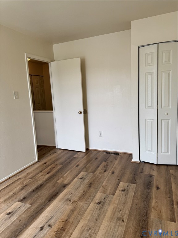 419 Roxana Road Henrico, VA 23075 - Photo 4 of 17 Warm wood-finish flooring complements light-toned