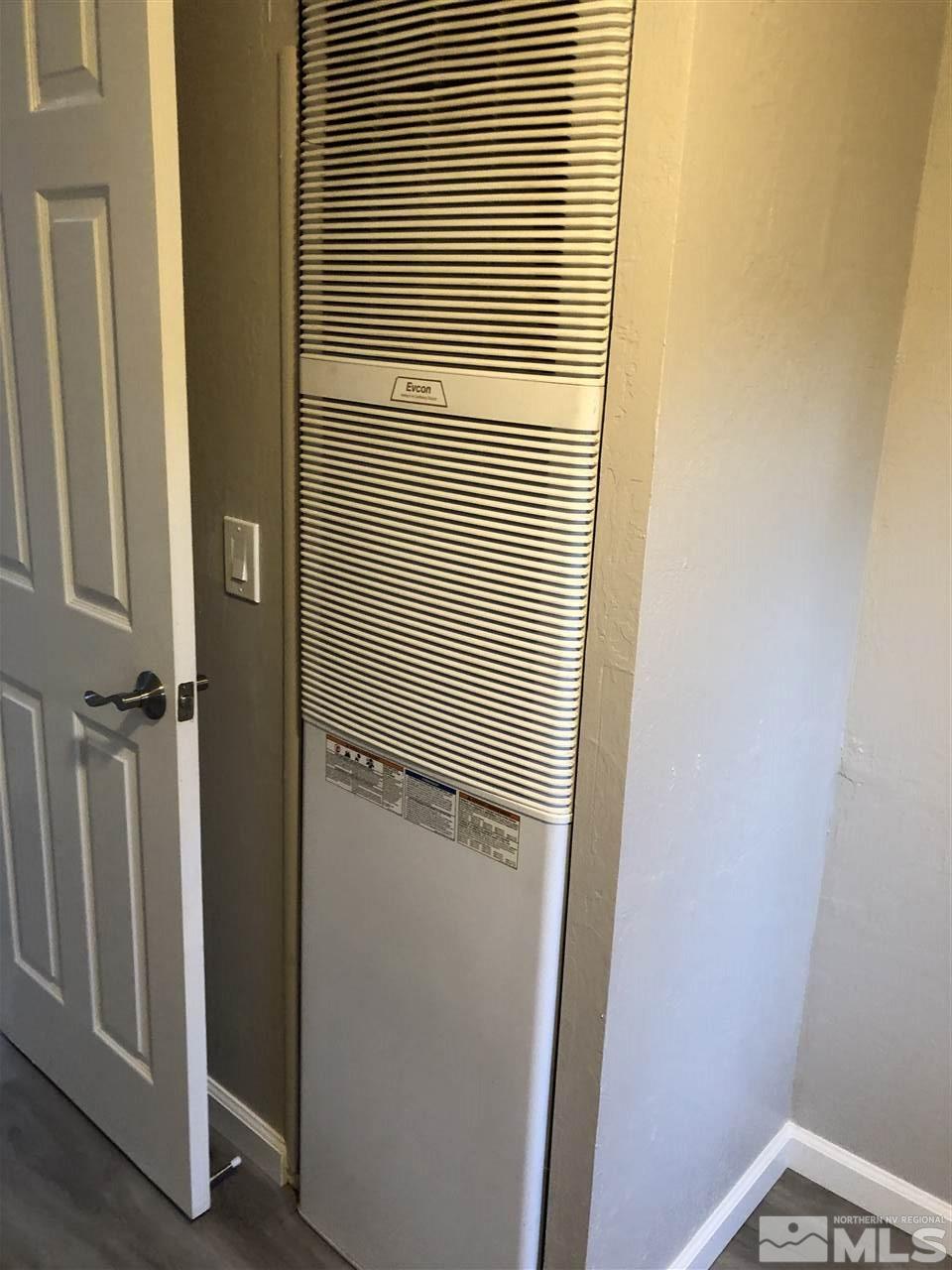 2631 Zinnia Avenue Reno, NV 89512 - Photo 14 of 15 a view of a bathroom with a door