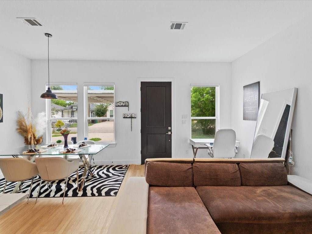3549 Amos Street Houston, TX 77021 - Photo 23 of 25 a living room with furniture and a large window