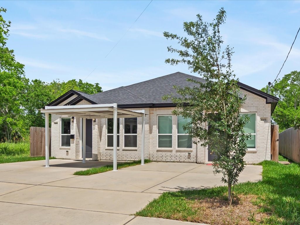 3549 Amos Street Houston, TX 77021 - Photo 25 of 25 a house with a tree in front of it