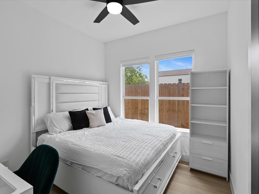 3549 Amos Street Houston, TX 77021 - Photo 8 of 25 a bedroom with a large bed and a window