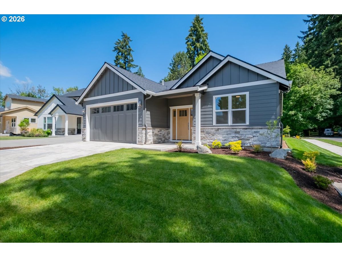 2147 Northeast Spitz Road Canby, OR 97013 - Photo 1 of 48 a front view of house with yard and green space