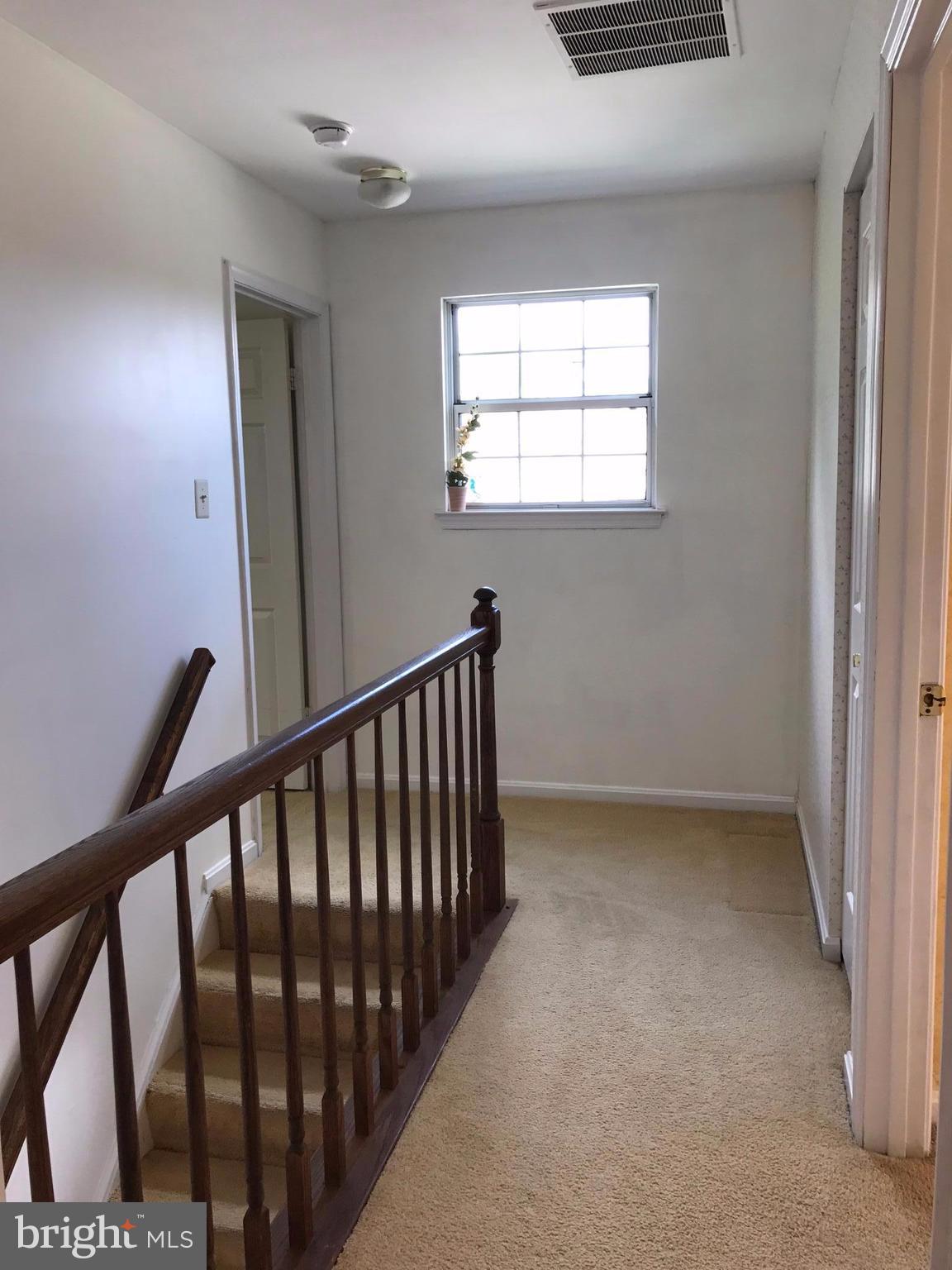 24227 Preakness Drive Damascus, MD 20872 - Photo 11 of 28 Upper level hallway