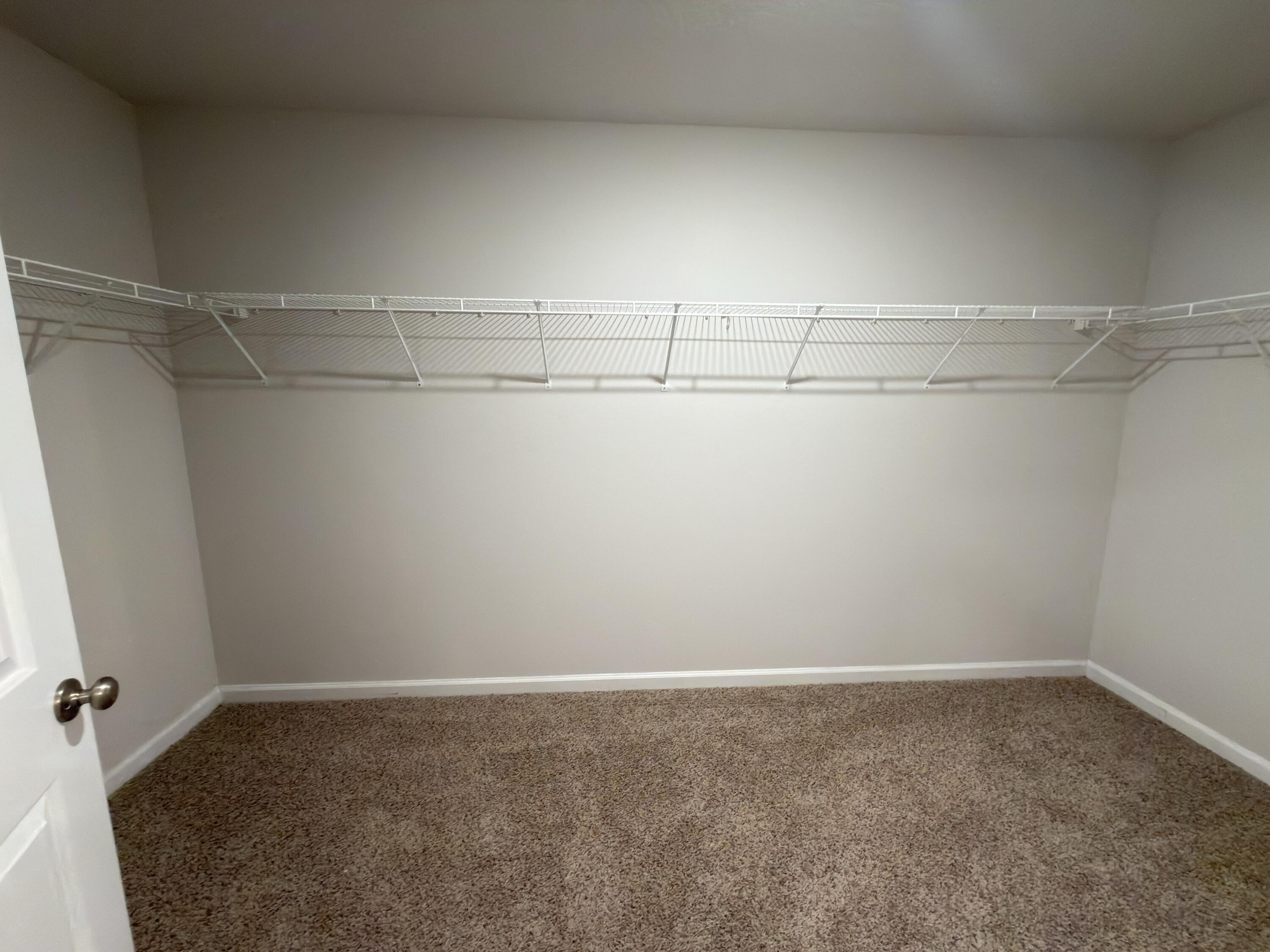 3545 Sugar Maple Lane Crestview, FL 32539 - Photo 11 of 27 a view of a room with racks on the wall