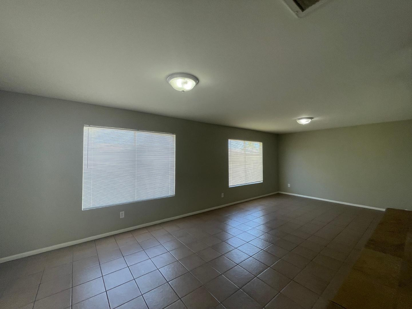 10902 West Montecito Avenue Phoenix, AZ 85037 - Photo 11 of 22 an empty room with windows