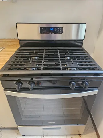 a room with a window and a chair