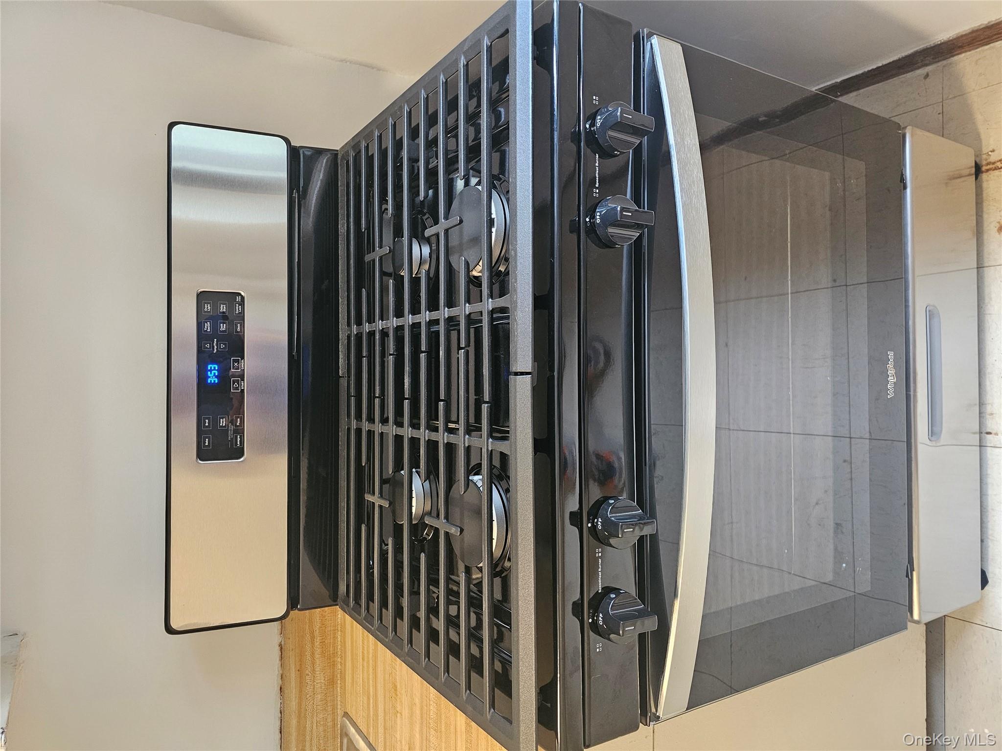 21-85 34th Avenue, Unit 3B Queens, NY 11106 - Photo 9 of 12 a close view of stove