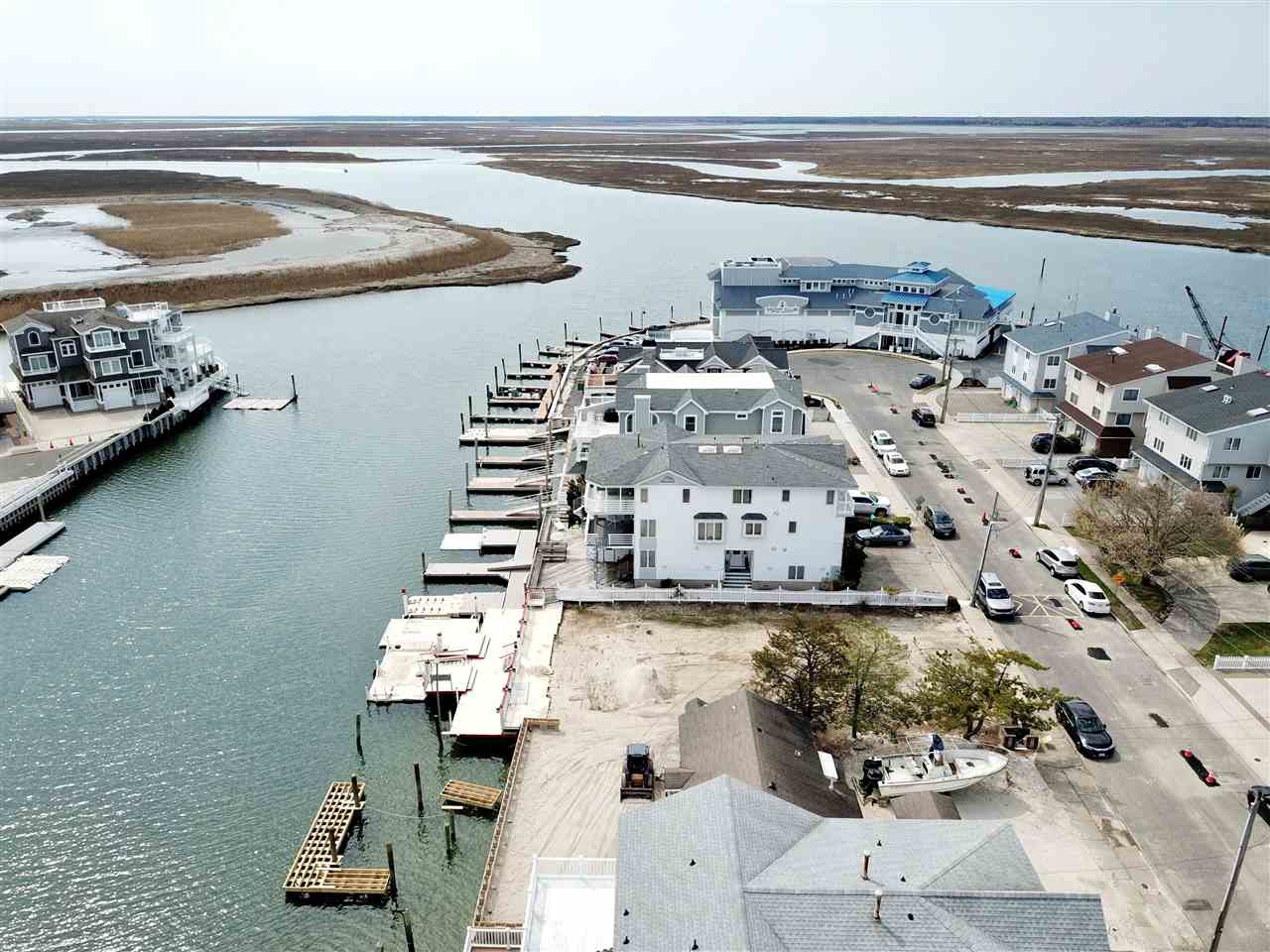 4471 Venicean Road, Unit NORTH Sea Isle City, NJ 08243 - Photo 10 of 14 a view of building with ocean view