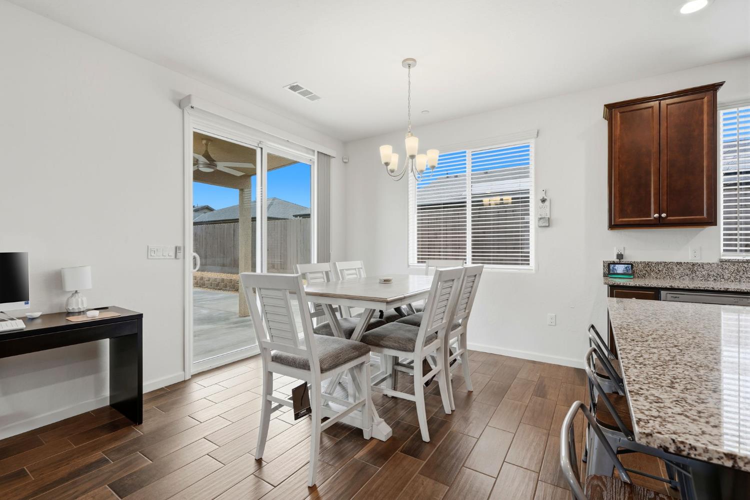 3125 Seymour Street Tulare, CA 93274 - Photo 26 of 52 a dining room with furniture and window