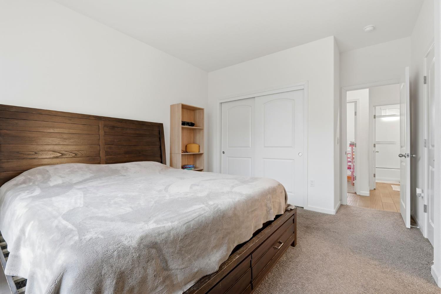 3125 Seymour Street Tulare, CA 93274 - Photo 28 of 52 a bedroom with a bed and a closet