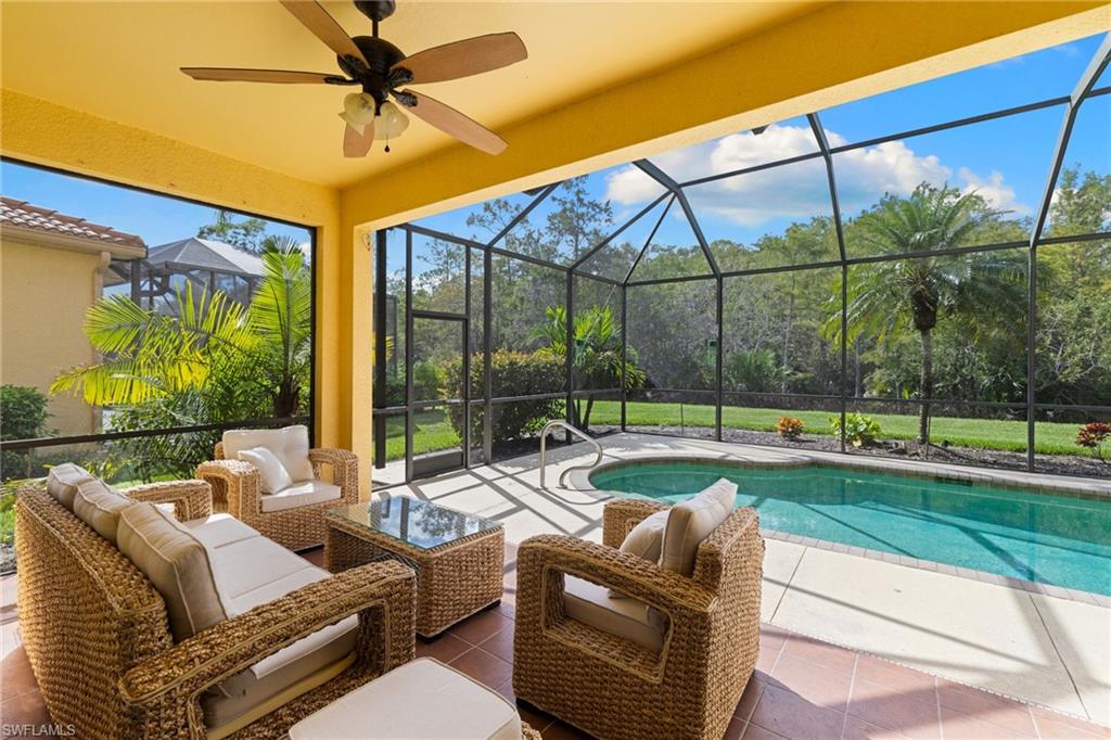 a outdoor space with patio the couches and pool chair with swimming pool