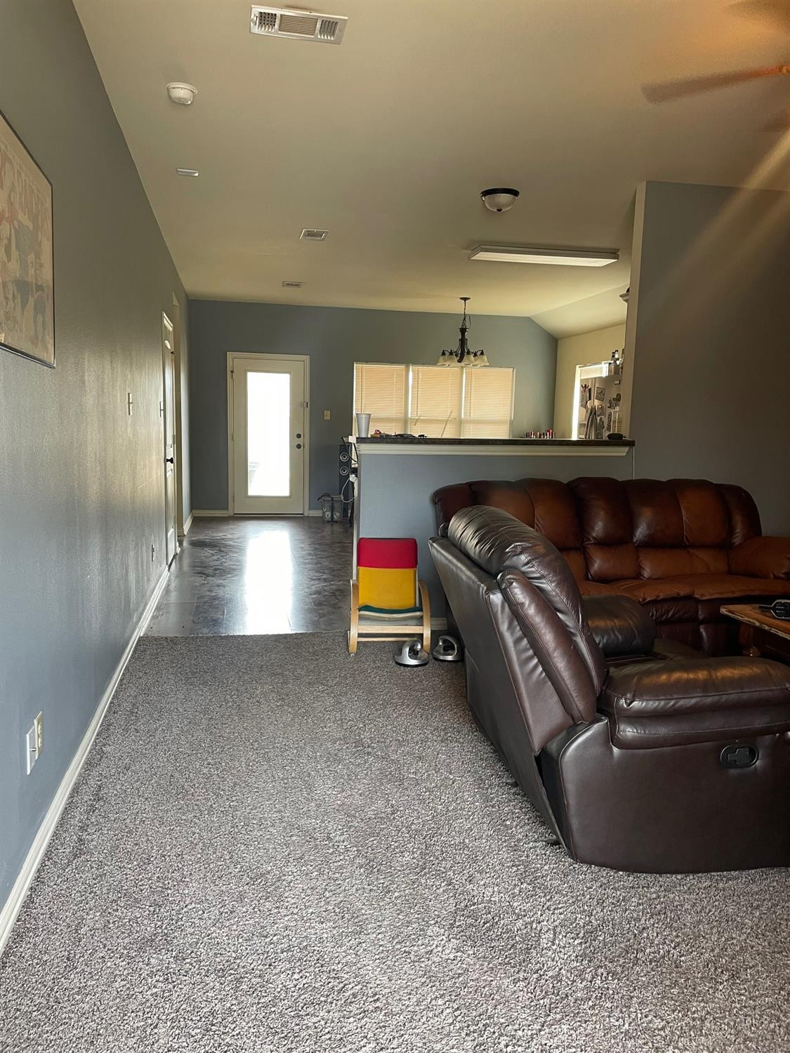 2624 112th Street Lubbock, TX 79423 - Photo 5 of 12 a living room with furniture and a couch