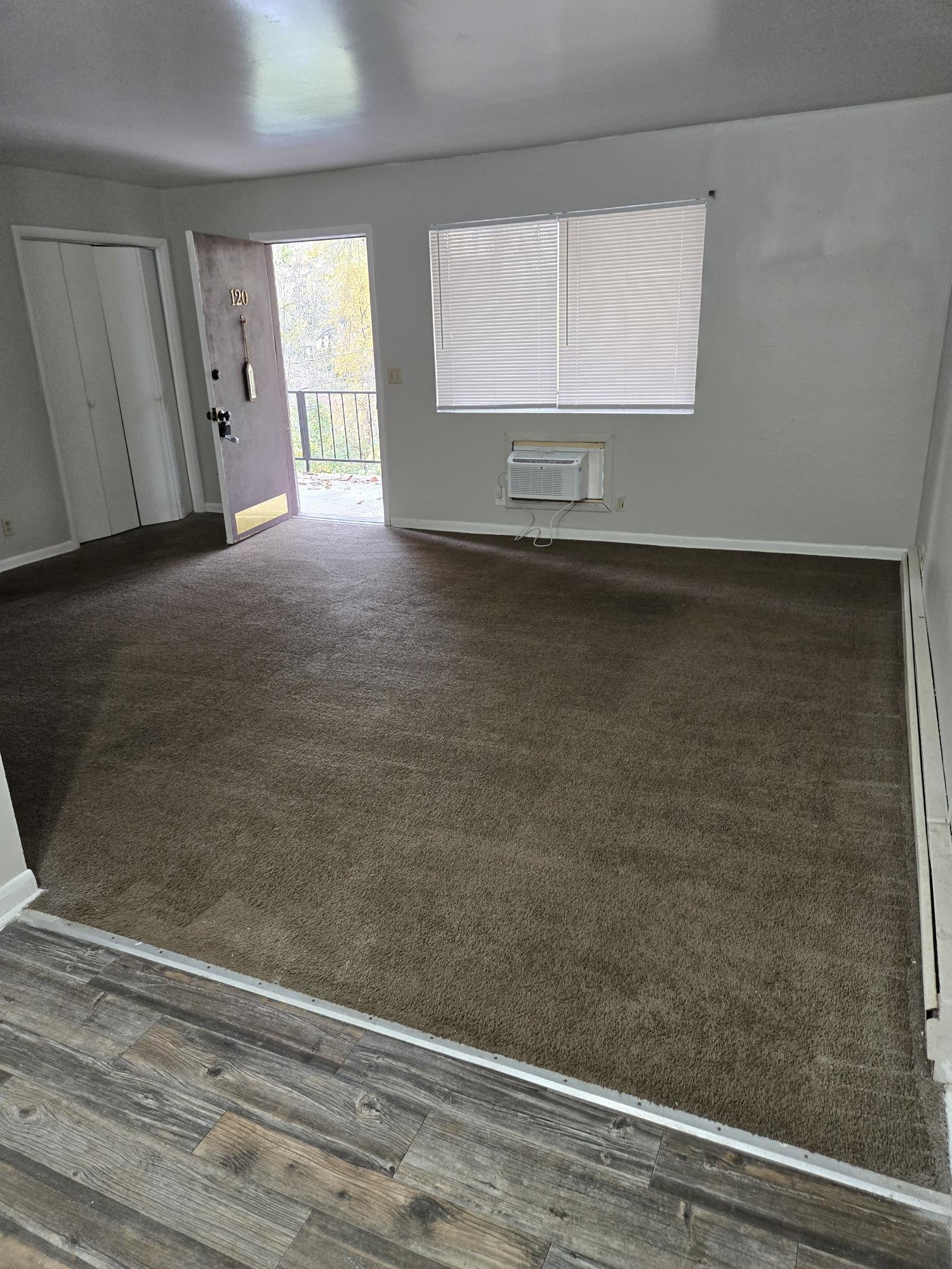 550 Harding Place, Unit F120 Nashville, TN 37211 - Photo 2 of 7 a view of a livingroom with wooden floor