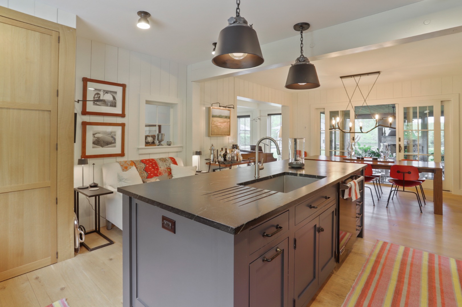 9 Ridge Hill Road Chilmark, MA 02535 - Photo 8 of 48 a kitchen with stainless steel appliances granite countertop a sink and wooden floor